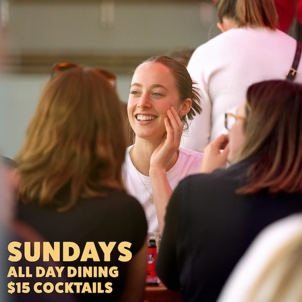 A poster for Sundays all day dining and $15 cocktails at Queen of the West