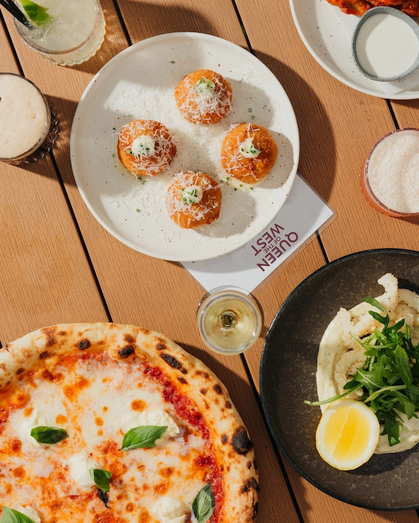 Plated food, drinks and pizza