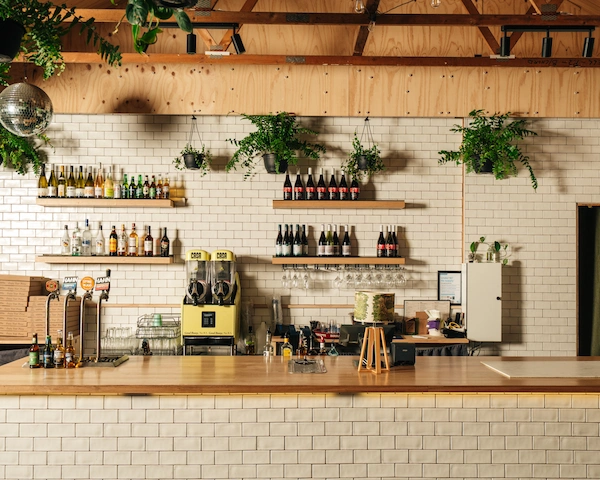 An image of the Queen of the West Garden bar showing the great tiled bar and well presented shelves